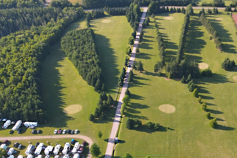 Aerial view of the Seal Cove golf course fairways beside the campground