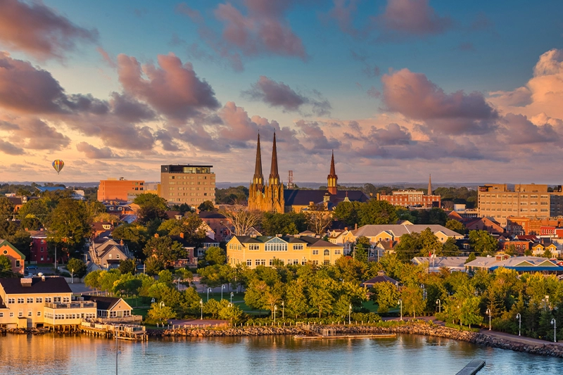Charlottetown waterfront skyline at golden hour with cathedral spires