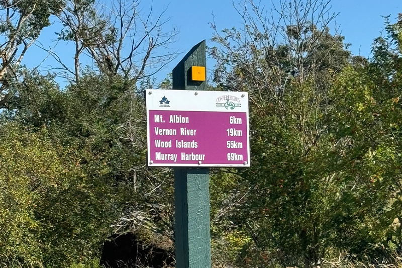 Confederation Trail distance sign showing Murray Harbour and other towns